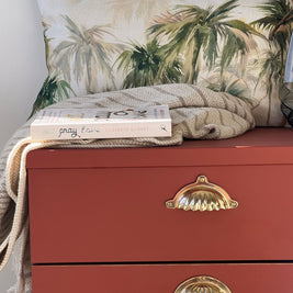 Autumn Rust chalk paint styled with natural textures and gold accents for an exotic look