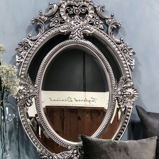 Not For Sale - Eugenia: Ornate oval sectional bevelled mirror