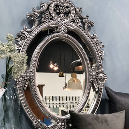 Not For Sale - Eugenia: Ornate oval sectional bevelled mirror