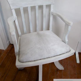 Commissioned coastal inspired swivel captains chair